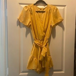 Yellow Romper jumpsuit size small worn once with a tie front